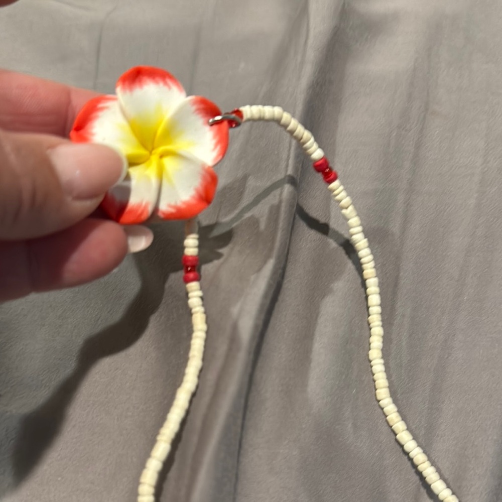 Hawaiis famous clam shell Elegant Floral Necklace with Red and Yellow Accents - Picture 3 of 7